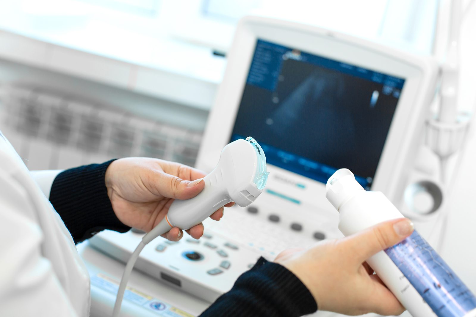 Doctor Prepare An Ultrasound Machine For The Diagnosis Of A Pati